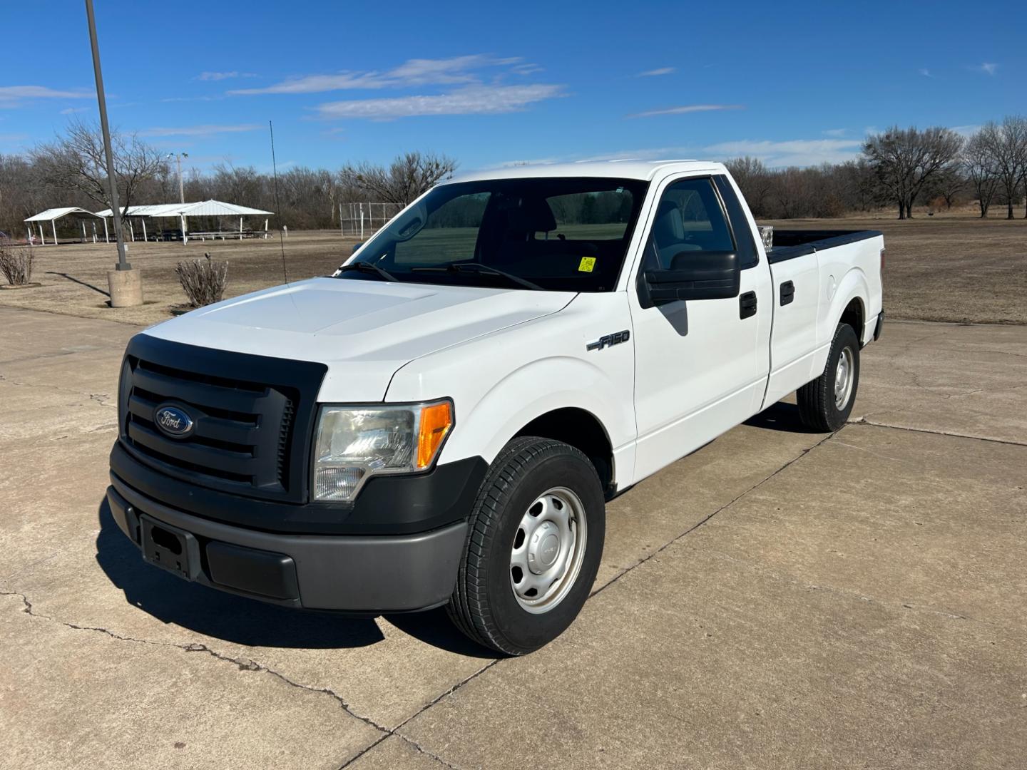 2011 White /Gray Ford F-150 STX 6.5-ft. Bed 2WD (1FTPF1CF1BK) with an 5.0L V8 OHV 16V engine, 4-Speed Automatic transmission, located at 17760 Hwy 62, Morris, OK, 74445, (918) 733-4887, 35.609104, -95.877060 - 2011 FORD F-150 HAS THE 5.0L V8 AND IS RWD. FEATURES POWER LOCKS, POWER WINDOWS, POWER MIRRORS, AM/FM STEREO, SIRIUS STEREO CD PLAYER, AUXILLARY PORT, BED LINER, CRUISE CONTROL, TRACTION CONTROL, MULTI-FUNCTION STEERING CONTROL. A PREMIER ALTERNATIVE FUEL CONVERSION THAT IS EPA-APPROVED. EXTREMELY C - Photo#0